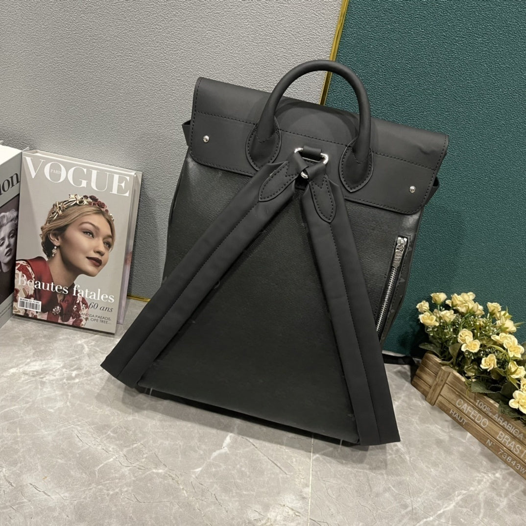 Men's new Joker casual natural cowhide silver-plated metal ornaments travel business commuter bag backpack.