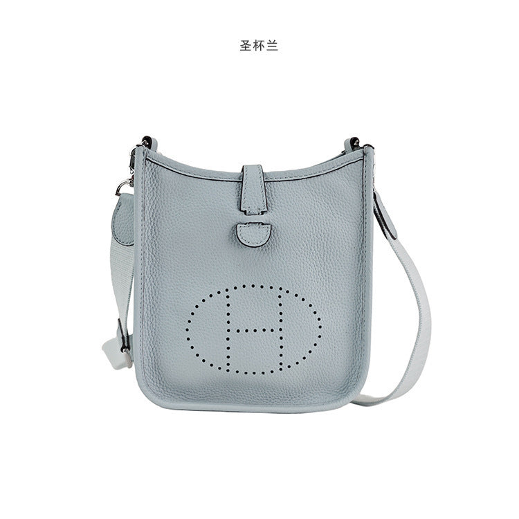 Women's New Fashion Joker Cowhide Shoulder Crossbody Bag with A High Sense of Hollowing Out The Commuter Bag.