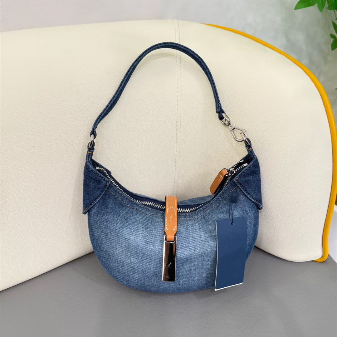 Women's new Joker embroidered denim leather portable daily shoulder bag.