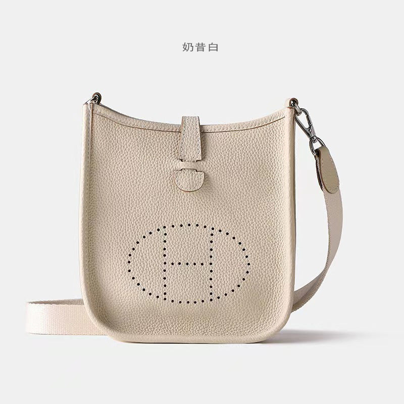 Women's New Fashion Joker Cowhide Shoulder Crossbody Bag with A High Sense of Hollowing Out The Commuter Bag.