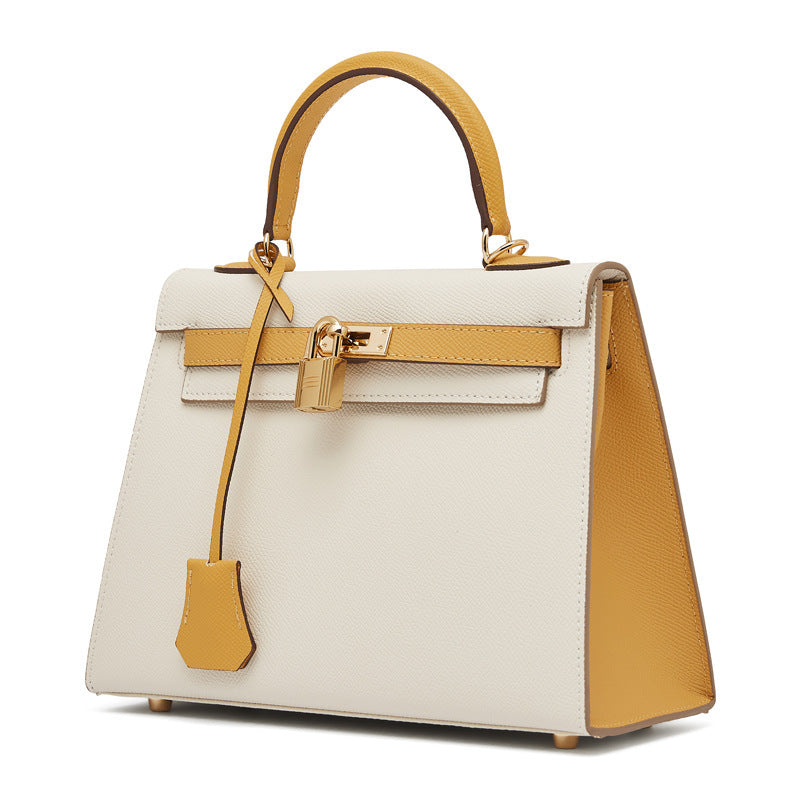 Women's New Leather Color Matching Design Palm Print Shoulder Messenger Bag Fashion Joker Handbag.