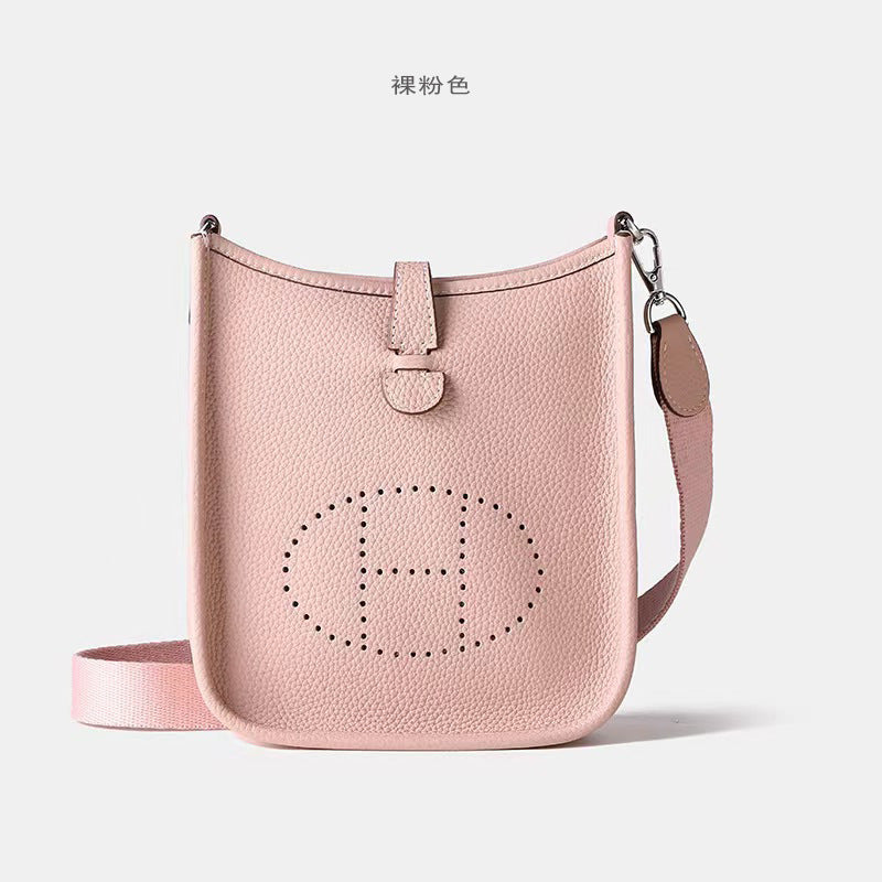 Women's New Fashion Joker Cowhide Shoulder Crossbody Bag with A High Sense of Hollowing Out The Commuter Bag.