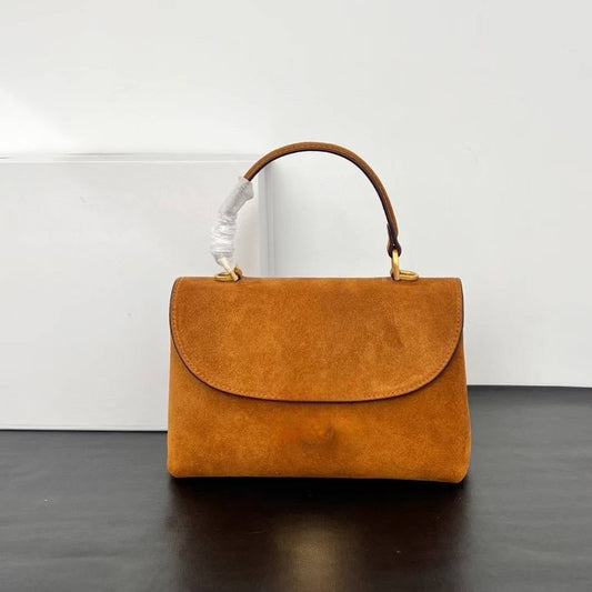 תיק יד חדש לנשים עם עיצוב נפתח מעור מט ממתכת בצבע ג'וקר.