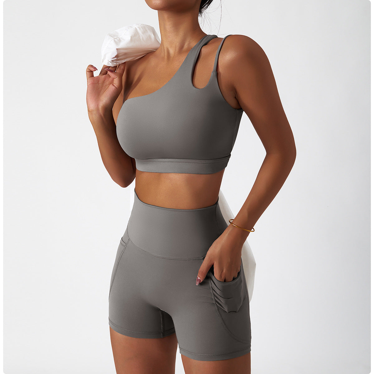 Women's new quick-drying nude sports inclined one-shoulder back yoga bra+pocket breathable fitness shorts