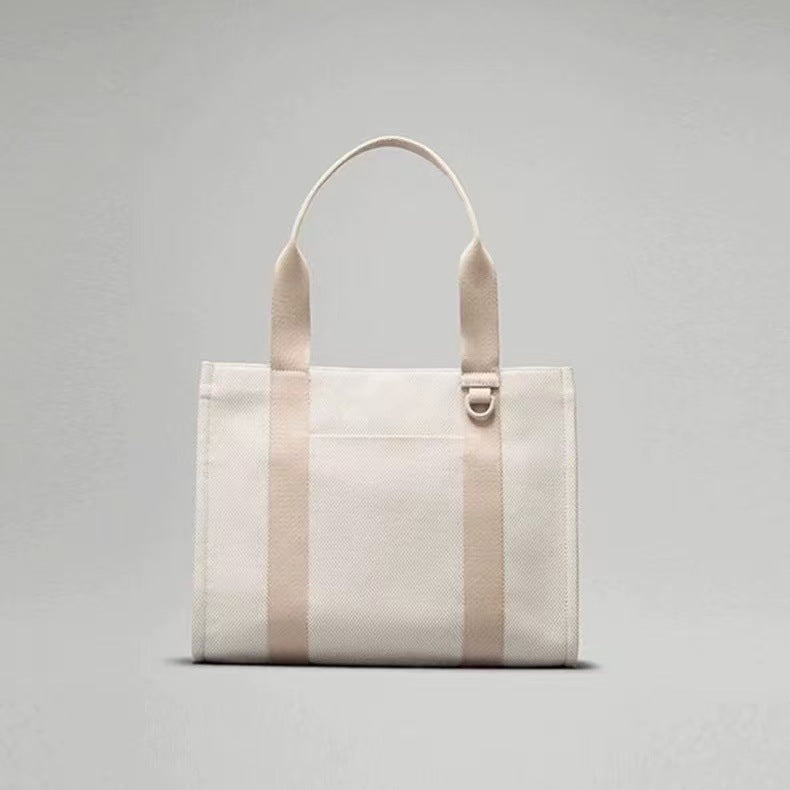 תיק בד אופנתי חדש לנשים של LU תיק כתף נייד בעל קיבולת גדולה מדגם ג'וקר בשני צבעים