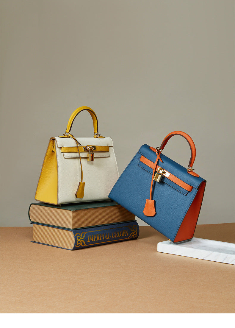 Women's New Leather Color Matching Design Palm Print Shoulder Messenger Bag Fashion Joker Handbag.