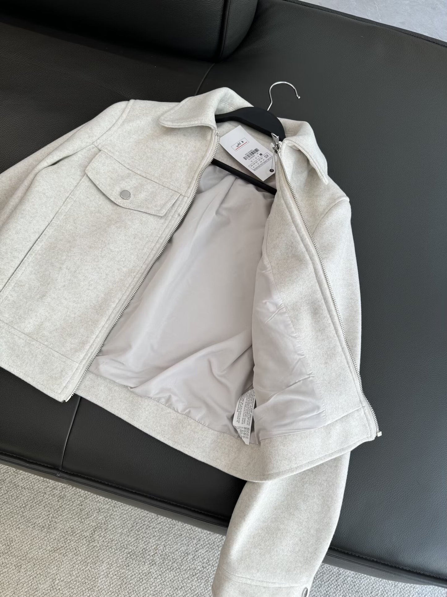 מעיל אופנה חדש לנשים לשנת 2025 עם רוכסן ומרקם רך